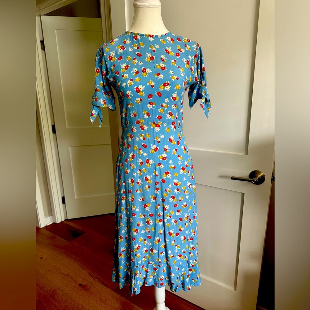 Fun dress, fitted at top with flowy bottom.